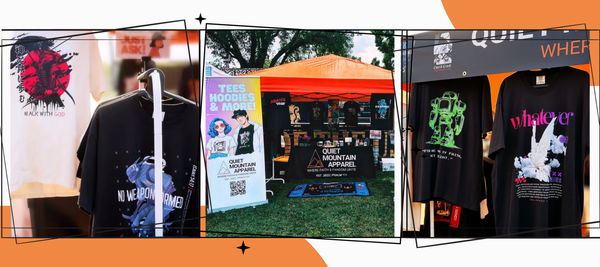 A collage showing multiple black graphic T-shirts on hangers and at an outdoor booth. The shirts feature colorful abstract and illustrated prints including red, blue, green, white, and purple designs with text such as 'NO WE' and 'whate ver'.