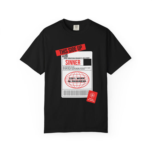 Black t-shirt with a label design on a white background